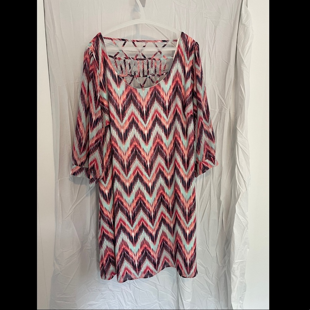 Want and Need knee length pink, purple, teal patter dress